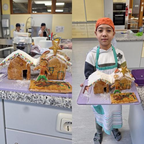 Schüler präsentiert sein Lebkuchenhaus